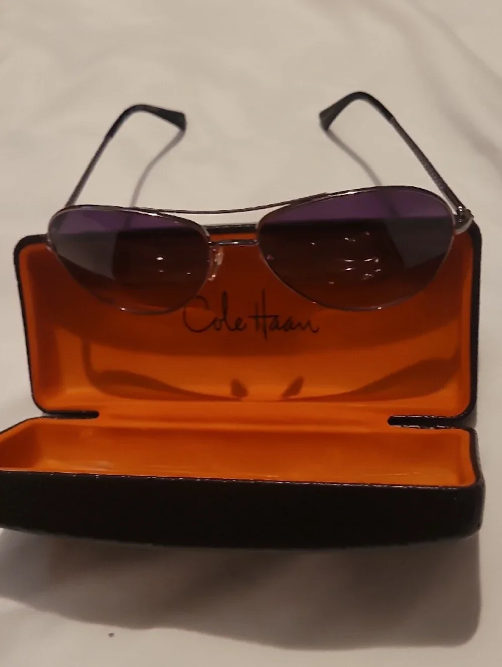 Cole Haan Aviator Sunglasses with Purple Lenses